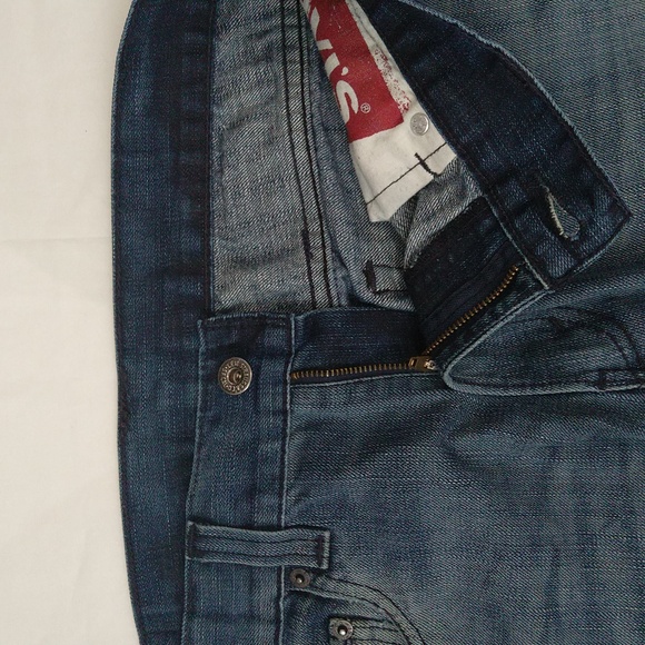 Levi's 597 men's casual low rise boot cut medium wash denim jeans sz 33×34 - Picture 3 of 16